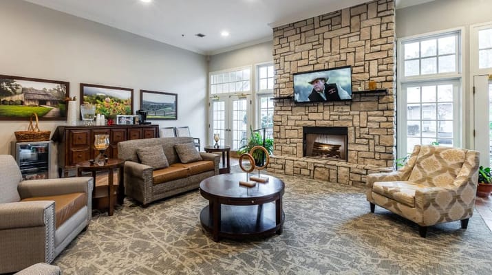 Cozy common area with comfortable seating and a TV
