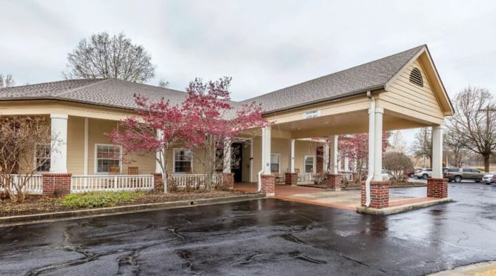 Front entrance of American House Bartlett with landscaped area