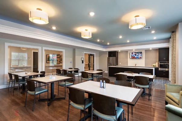 Bright dining area with tables and chairs