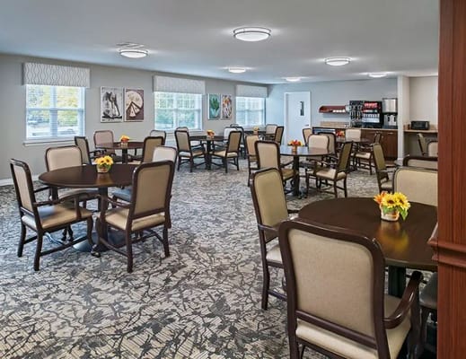 Bright dining room with tables and chairs