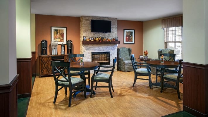 Cozy common area with tables and seating