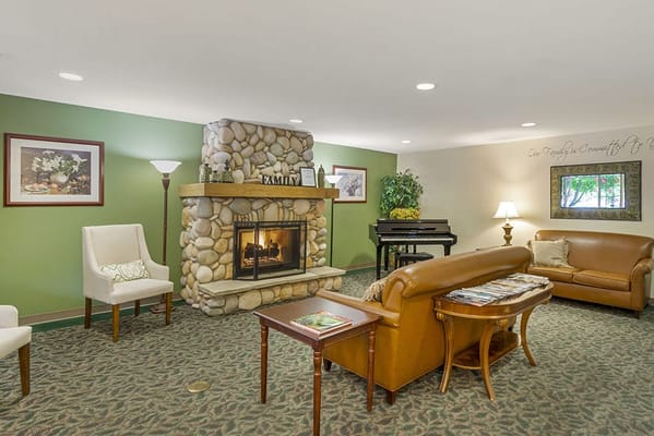 Cozy common area with a fireplace and seating
