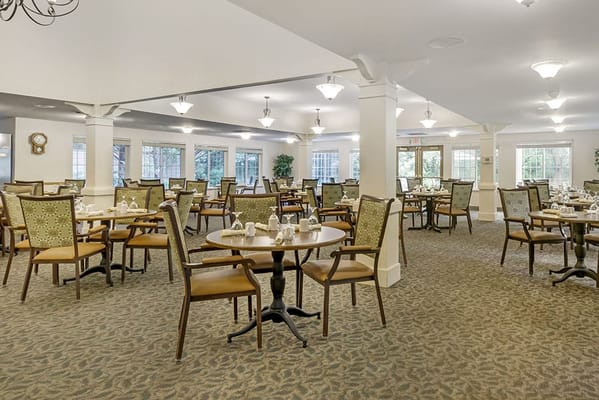 Bright dining room with tables and chairs