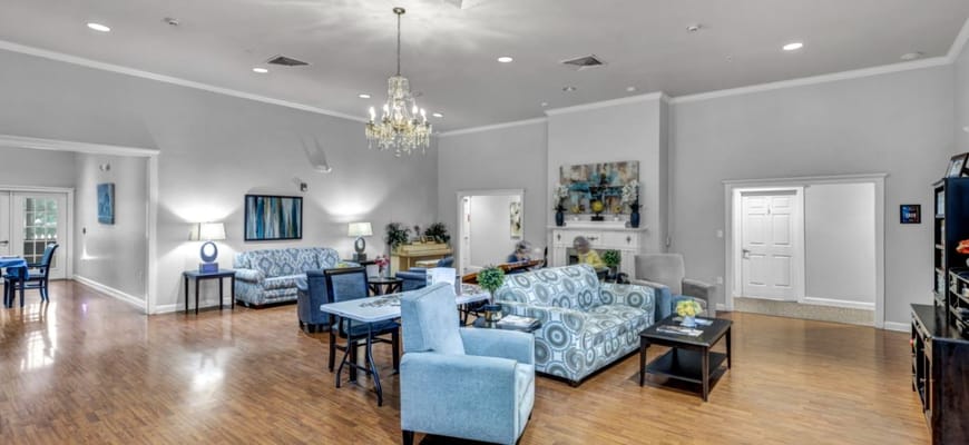 Bright common area with comfortable seating and decor