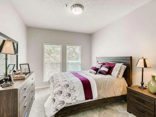 Cozy bedroom with natural light and soft decor