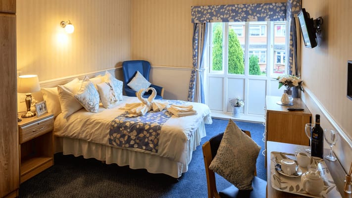 A cozy private room with a view and decor