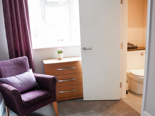 Interior view of a resident room with furniture