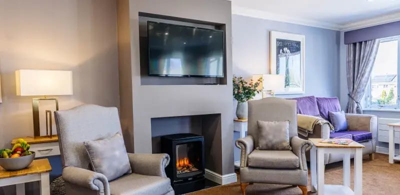 Comfortable common area with seating and television