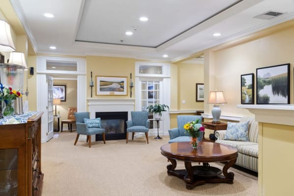 Comfortable living room with blue armchairs and a coffee table