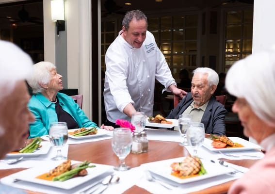 Dining experience with residents enjoying a meal
