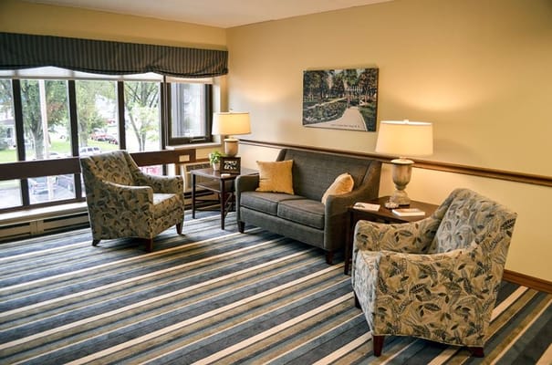 Comfortable seating area in a bright common room