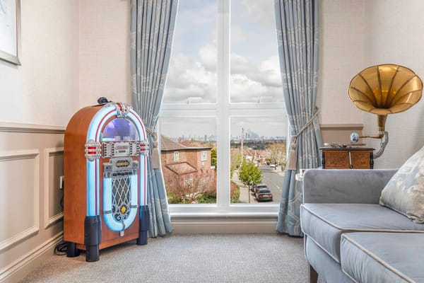 Cozy interior with a jukebox and sofa by the window