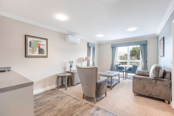 Bright, spacious living area in the facility