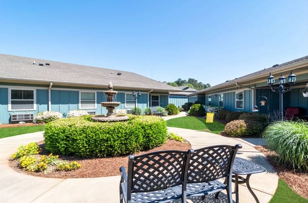 Quiet outdoor courtyard with fountain and seating