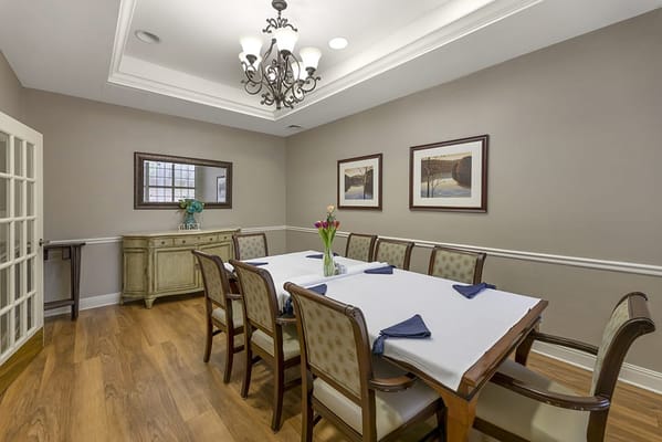 Bright dining room with elegant table settings