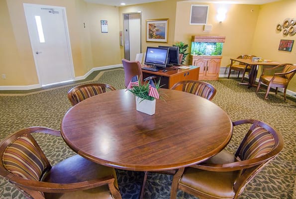 Interior common area with seating and computer station