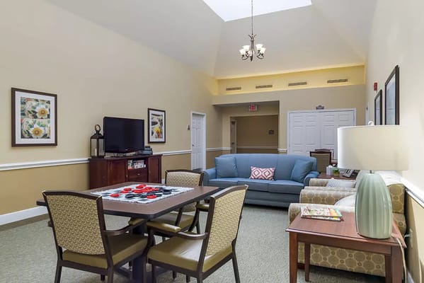 Bright common area with seating and decor