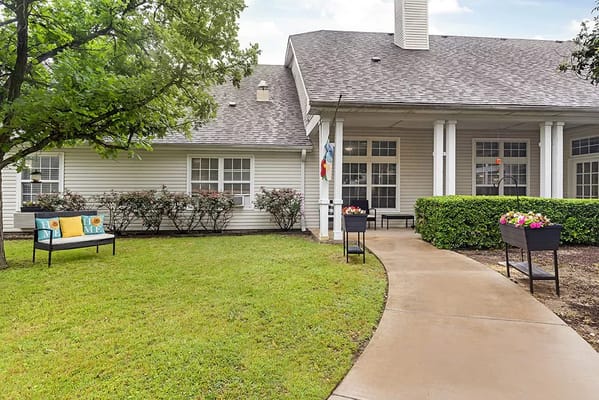 Outdoor space with seating and garden areas