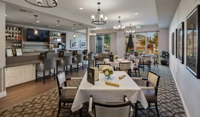 Bright dining room with tables and chairs