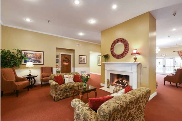 Living room with comfortable seating and a fireplace