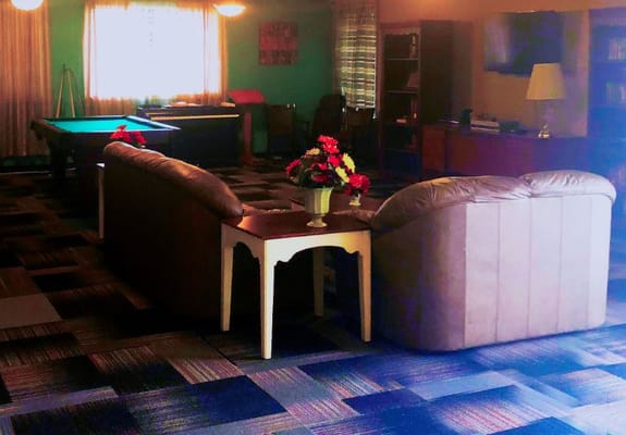 Common area with seating and pool table