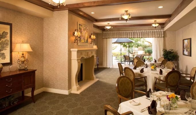 Dining area with tables set for a meal