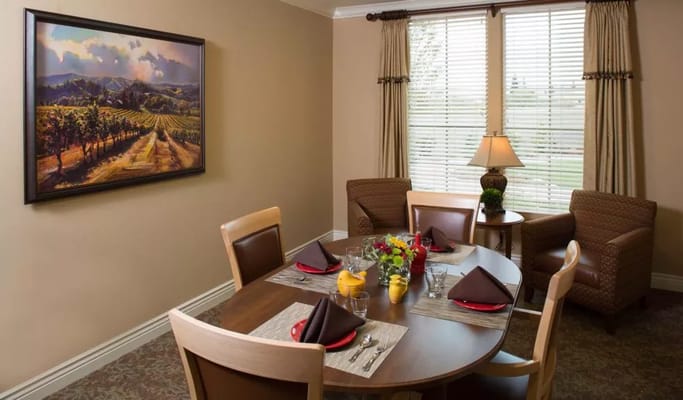 Dining room with a table set for a meal