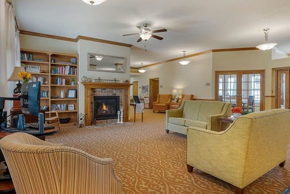 Cozy common area with comfortable seating and a fireplace