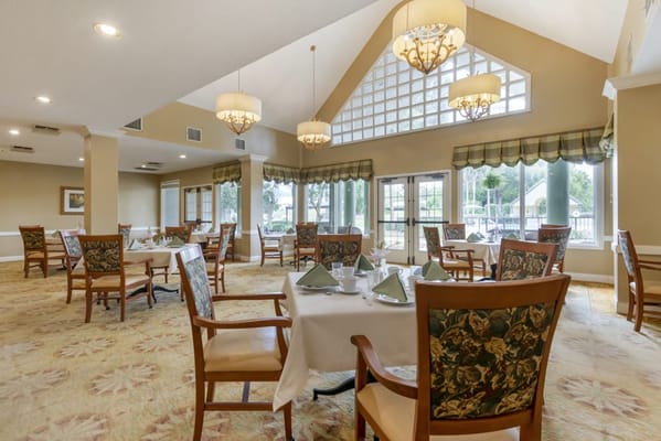 Elegant dining area with tables and chairs set up
