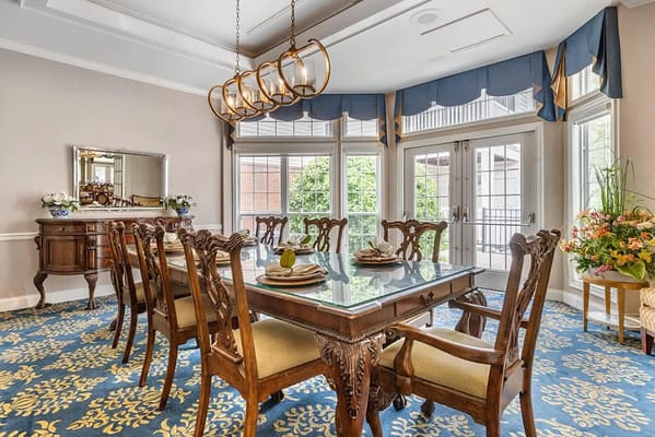 Bright dining area with elegant wooden furniture
