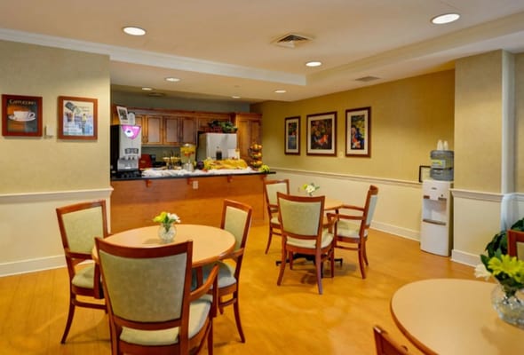 Bright dining area with tables and decorations
