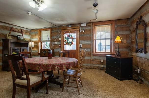 Cozy common area with a round table and chairs