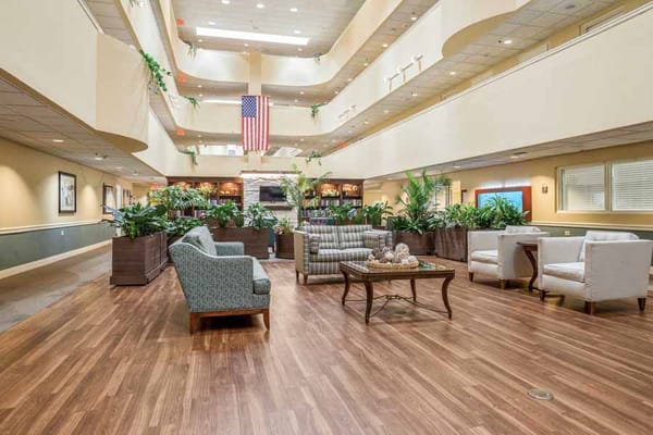 Interior view of a bright common area with seating
