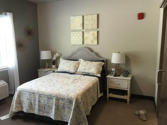 Cozy resident room with bed and decor