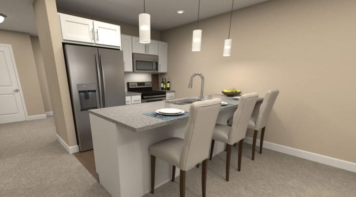 A modern kitchen with a gray countertop and bar seating.