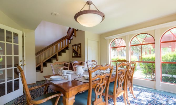 Bright dining room with a large wooden table