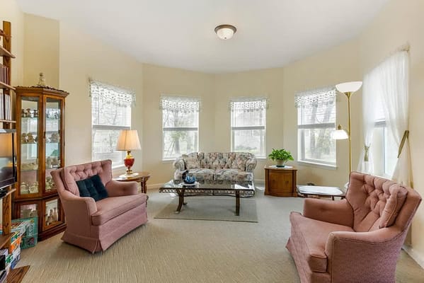 Interior common area with seating and windows
