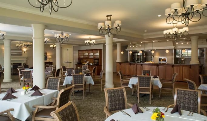 Dining area with tables set for meals