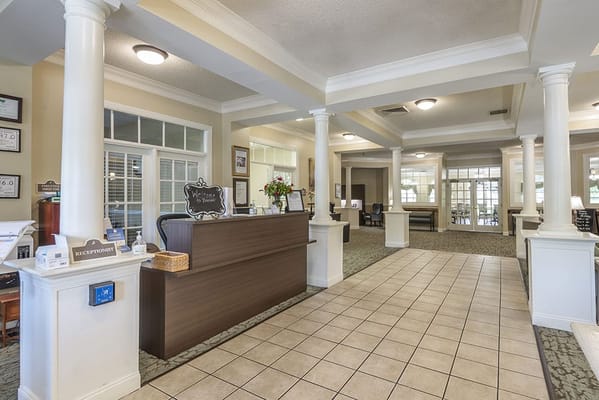 Bright reception area with seating and decor