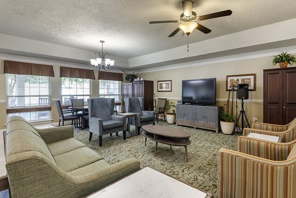 Common area with seating and a television