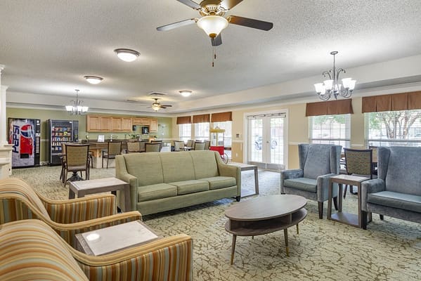 Interior common area with seating and kitchen