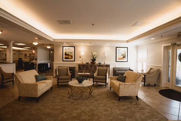 Cozy lobby area with seating and decorative accents
