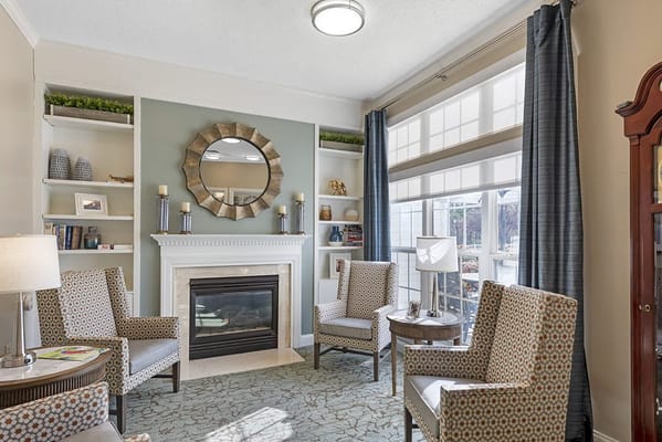 Cozy common area with comfortable seating and fireplace