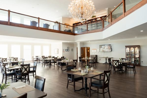 Bright dining area with tables set for meals