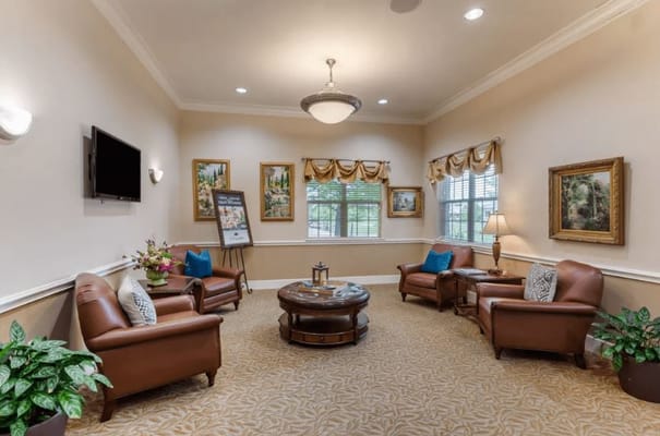 Cozy common area with comfortable seating and artwork
