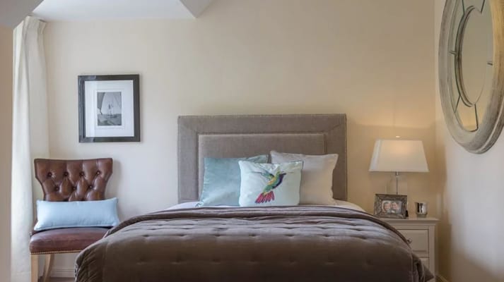 Cozy bedroom with elegant decor and personal touches