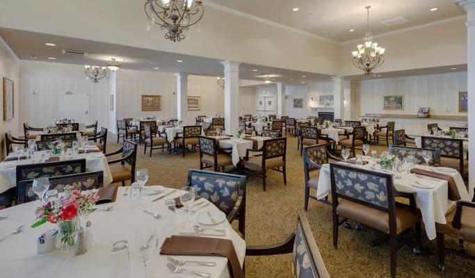 Elegant dining area set for a meal