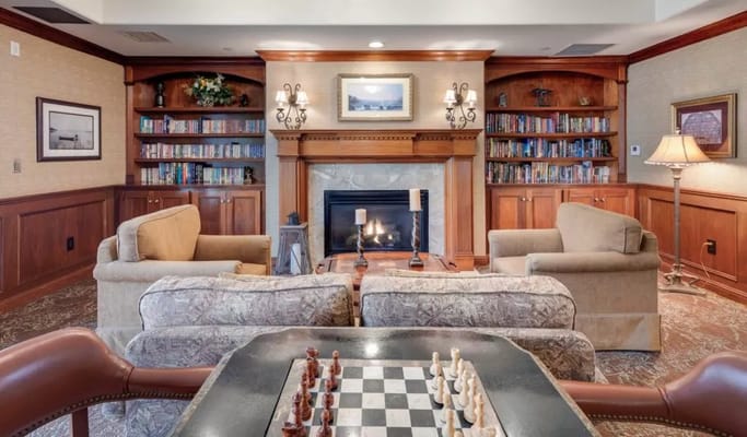Cozy common area with seating and a chess board