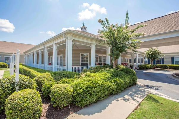 Exterior view of a charming senior living facility