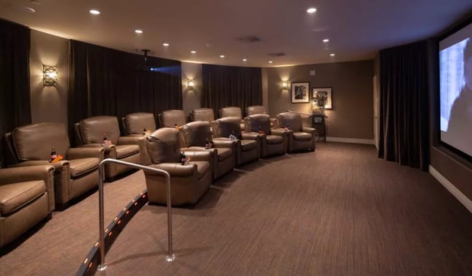 Cozy private movie theater with reclining chairs
